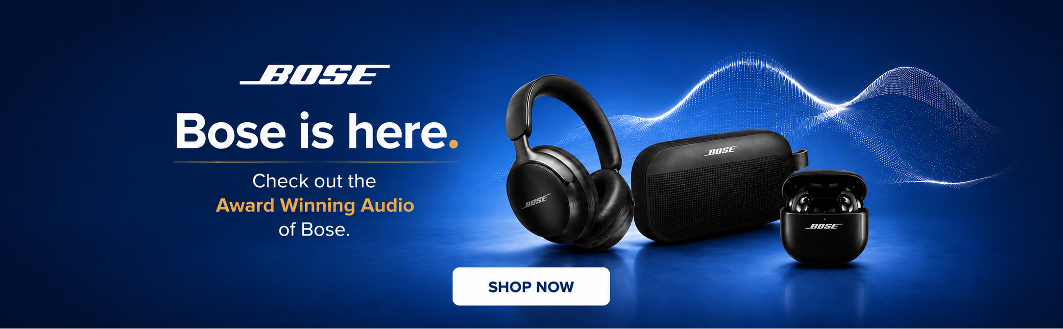 Bose over-ear wireless headphones, a black carrying case, and a small charging case on a dark blue background with the text 'Bose is here.' and a 'SHOP NOW' button.